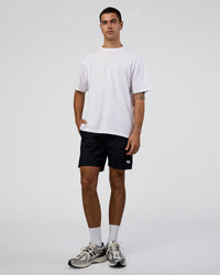 Man wearing Together We Rise FLXCotton Oversized Tee - White-Solar Lime | Model:Zoran | Size:L | Thumbnail Index: 1