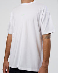 Man wearing Together We Rise FLXCotton Oversized Tee - White-Solar Lime | Model:Zoran | Size:L | Thumbnail Index: 6