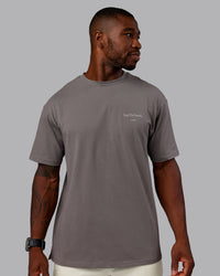 Man wearing Trust The Process 2.0 FLXCotton Tee Oversize - Storm Front-Shale Beige | Model:Sam | Size:L | Thumbnail Index: 3