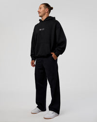 Man wearing Trust The Process Unisex Oversized Hoodie - Black-White | Model:Jaiden | Size:L | Thumbnail Index: 9