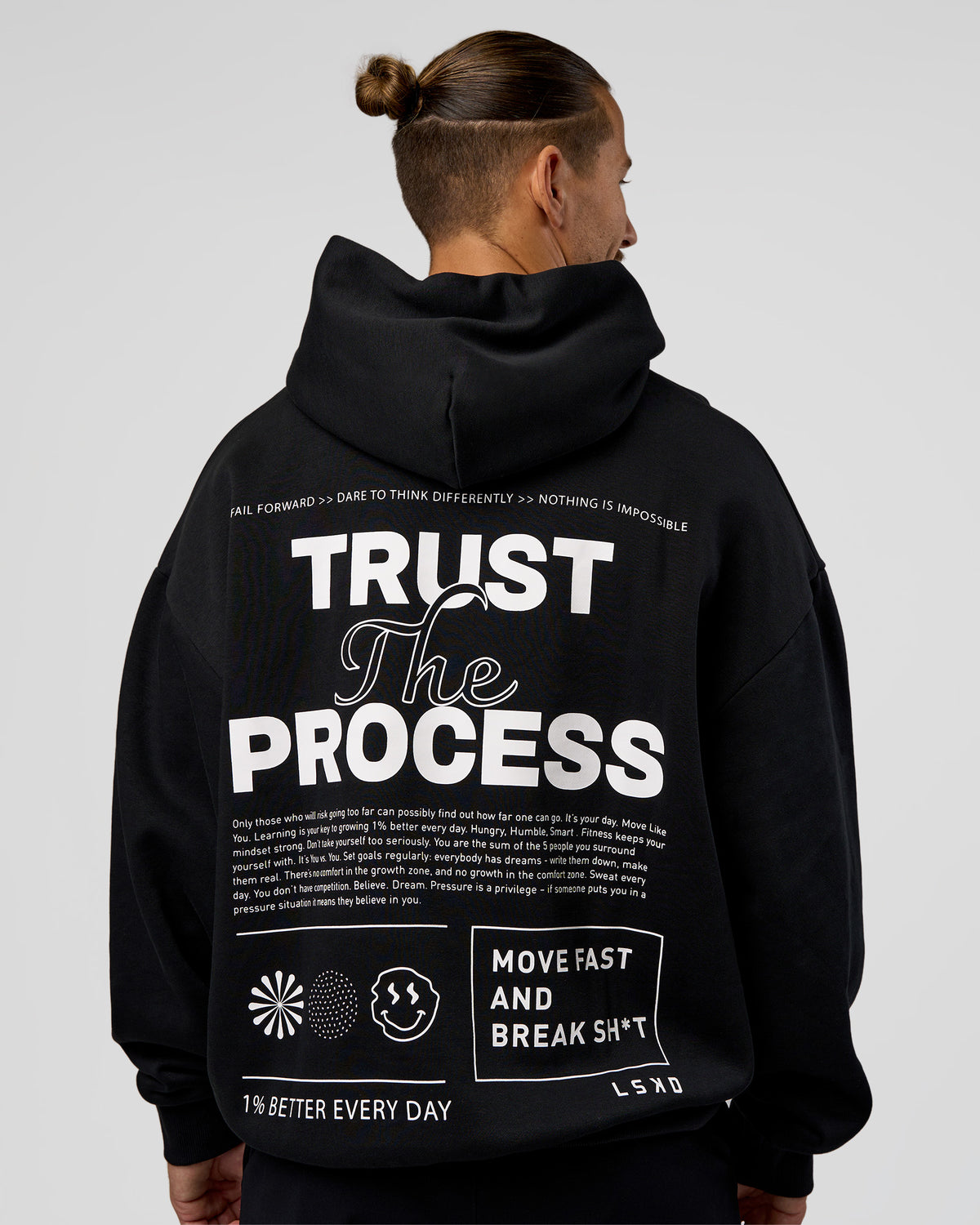Man wearing Trust The Process Unisex Oversized Hoodie - Black-White | Model:Jaiden | Size:L