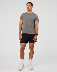 Man wearing UltraAir 5" Lined Performance Short  - Black-Reflective | Model:Liam | Size:L | Thumbnail Index: 4