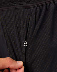 Man wearing UltraAir 5" Lined Performance Short  - Black-Reflective | Model:Liam | Size:L | Thumbnail Index: 9