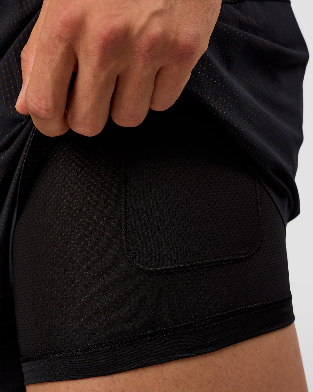 Man wearing UltraAir 5" Lined Performance Short  - Black-Reflective | Model:Liam | Size:L - view 12