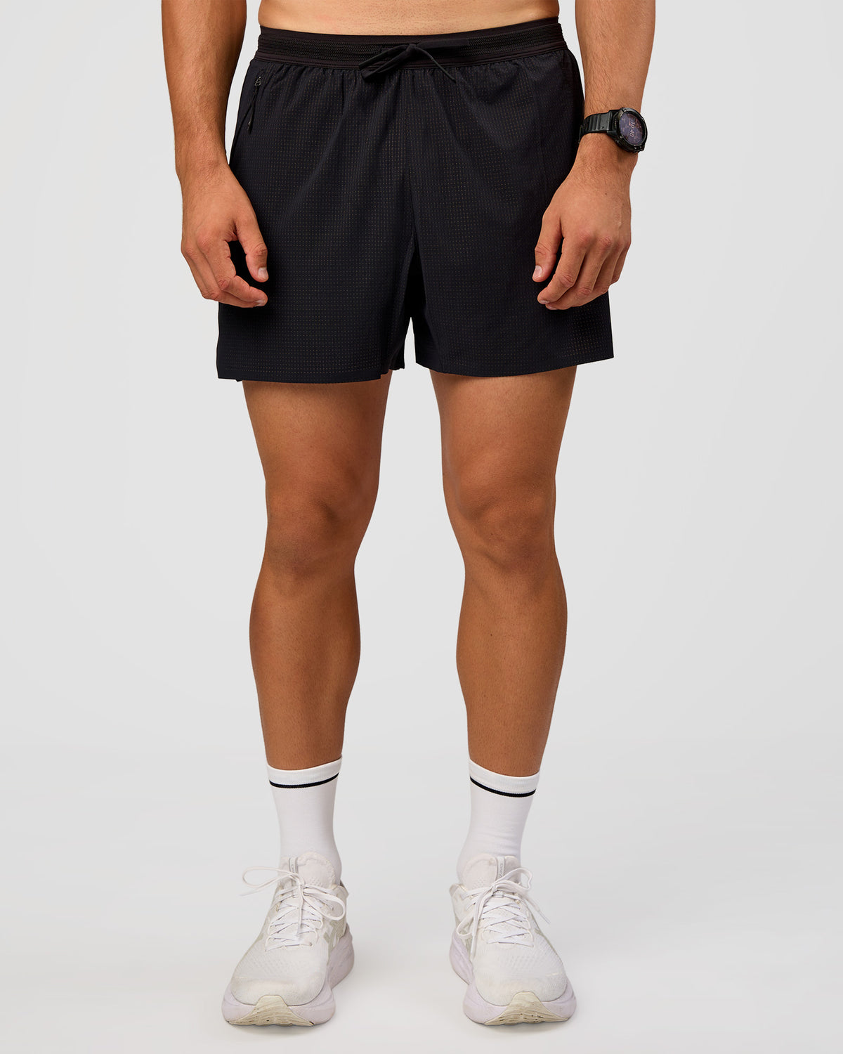 Man wearing UltraAir 5" Lined Performance Short  - Black-Reflective | Model:Liam | Size:L