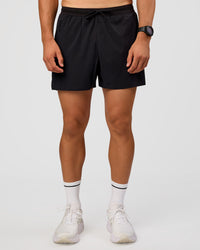 Man wearing UltraAir 5" Lined Performance Short  - Black-Reflective | Model:Liam | Size:L | Thumbnail Index: 0