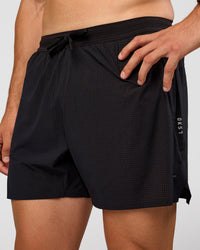 Man wearing UltraAir 5" Lined Performance Short  - Black-Reflective | Model:Liam | Size:L | Thumbnail Index: 10