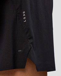 Man wearing UltraAir 5" Lined Performance Short  - Black-Reflective | Model:Liam | Size:L | Thumbnail Index: 8