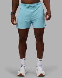 Man wearing UltraAir 5" Lined Performance Short - Retro Blue | Model:Sam | Size:L | Thumbnail Index: 0