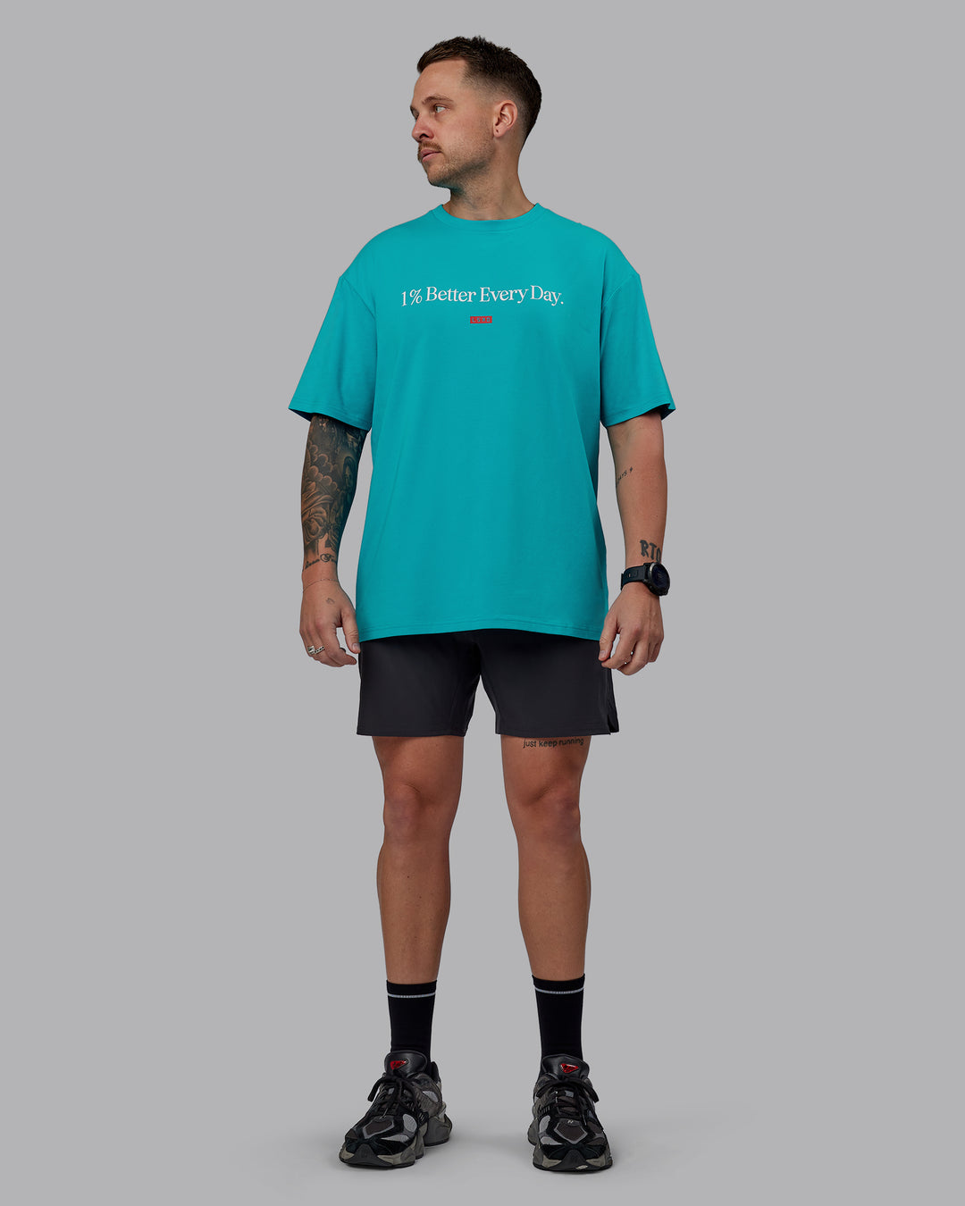 Man wearing Unisex 1% Better FLXCotton Tee Oversize - Blue Bird-White - view 8