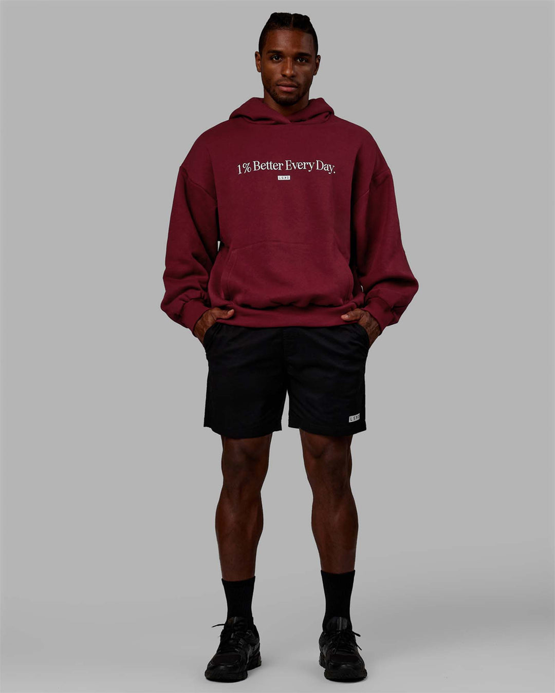 Man wearing Unisex 1% Better Hoodie Oversize - Cranberry-White - view 8