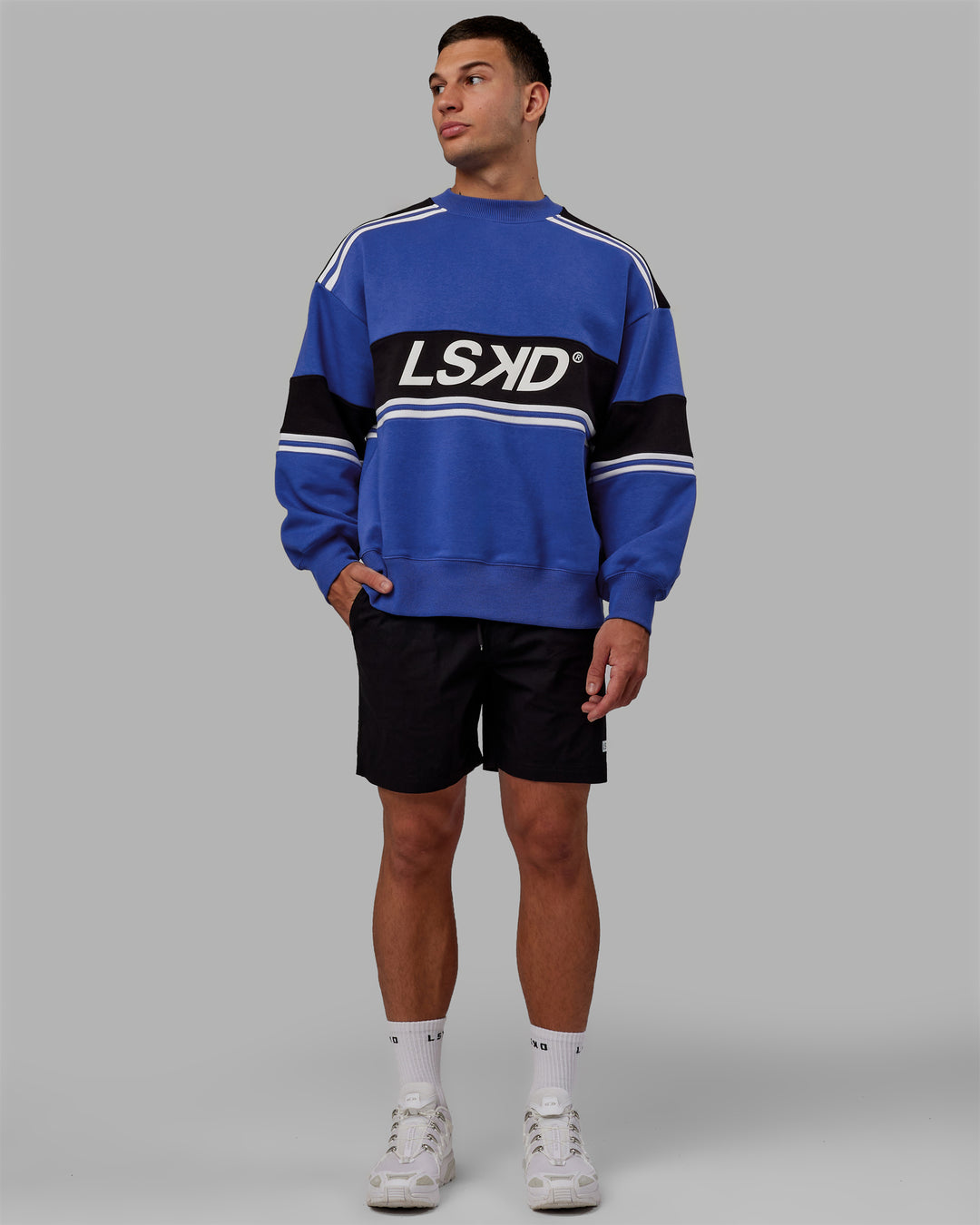 Man wearing Unisex A-Team Sweater Oversize - Power Cobalt-Black - view 9