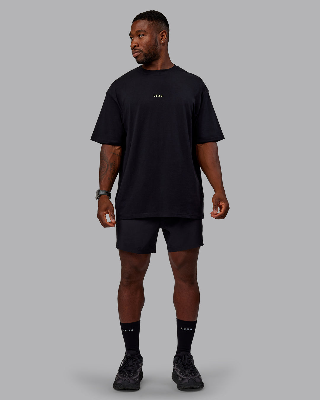 Man wearing Unisex Leg It FLXCotton Tee Oversize - Black-Volt - view 12