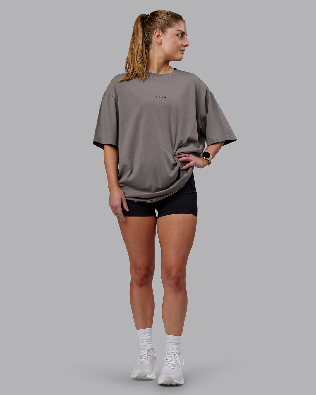 Woman wearing Unisex Leg It FLXCotton Tee Oversize - Storm Front-Black - view 11