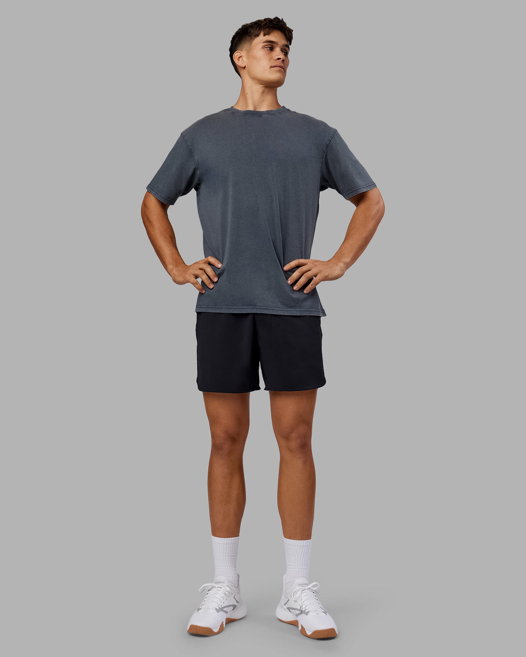 Man wearing Lifting Club FLXCotton Tee Oversize - Dark Storm Washed-Blue | Model:Jackson | Size:L - view 7