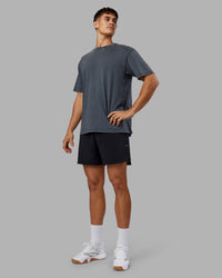 Man wearing Lifting Club FLXCotton Tee Oversize - Dark Storm Washed-Blue | Model:Jackson | Size:L | Thumbnail Index: 4