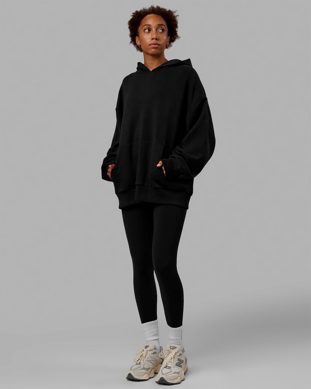 Woman wearing Unisex Love The Run Hoodie Oversize - Black-White - view 5