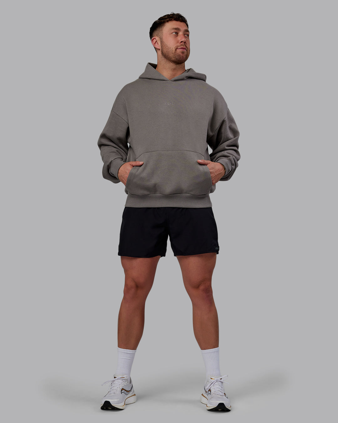 Man wearing Unisex MVP Hoodie Oversize - Storm Front - view 8