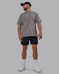 Man wearing Unisex Miami25 Washed FLXCotton Tee Oversize - Storm Front-Lemon Fizz | Thumbnail Index: 7