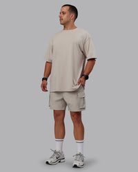 Man wearing Set The Standard Washed FLXCotton Oversized Tee - Shale Beige | Size:L | Thumbnail Index: 4
