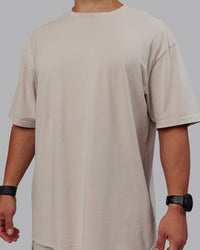 Man wearing Set The Standard Washed FLXCotton Oversized Tee - Shale Beige | Size:L | Thumbnail Index: 6