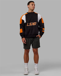 Man wearing Unisex Slam Sweater Oversize - Black-Ultra Orange | Thumbnail Index: 2