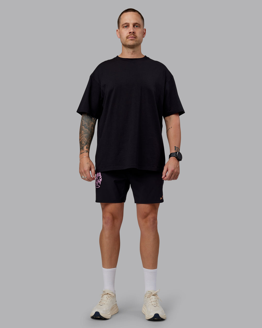 Man wearing Unisex So Cal 24 FLXCotton Tee Oversize - Black-Beacon Orange - view 5