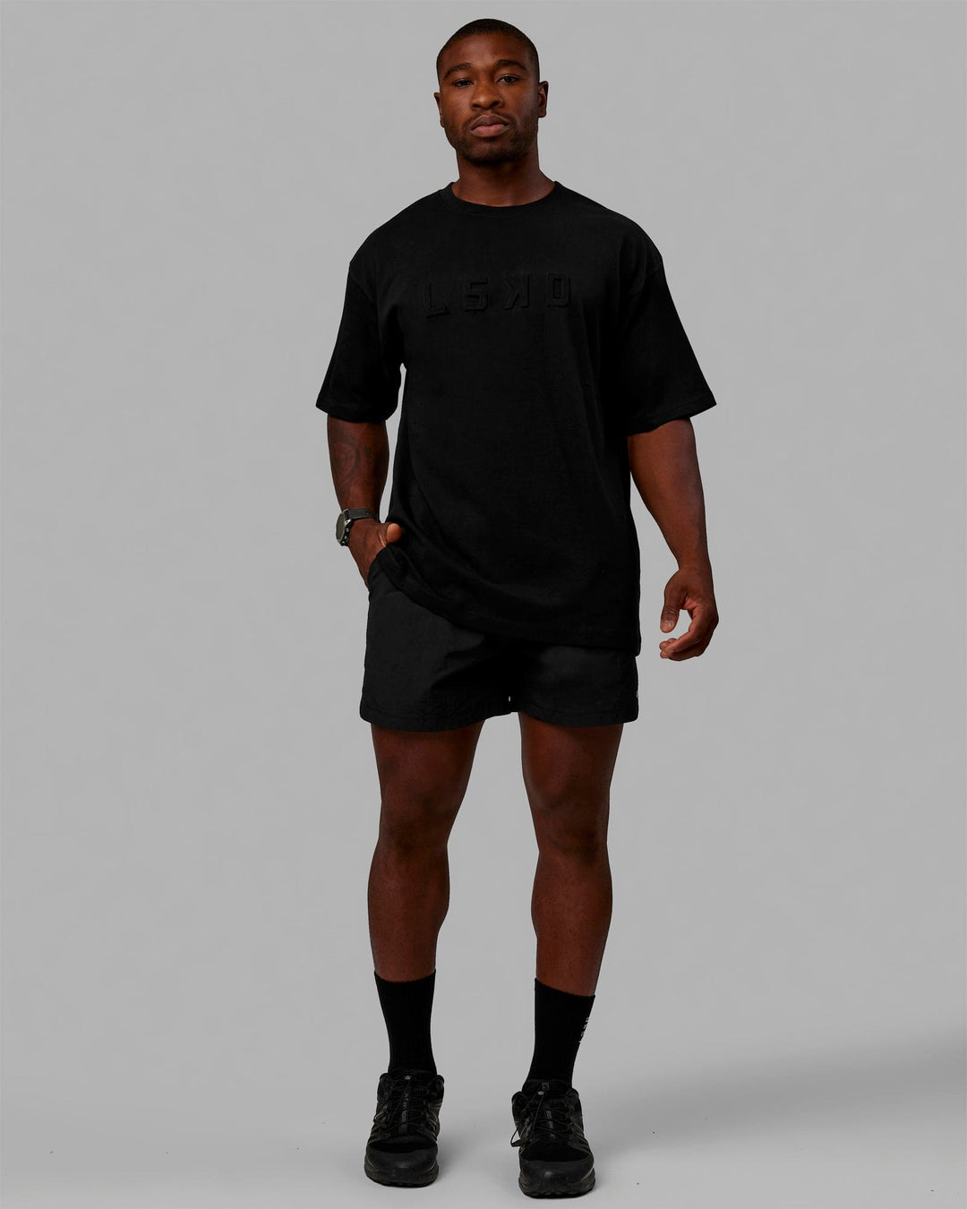 Man wearing Unisex Stamped 2.0 Heavyweight Tee Oversize - Black - view 9