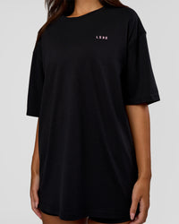 Woman wearing Unisex Strike Through FLXCotton Tee Oversize - Black-Candy Pink | Model:Kirstyn | Size:L | Thumbnail Index: 7