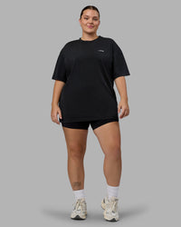 Woman wearing Unisex Washed Empower Tee Oversize - Black-Berry Pink | Thumbnail Index: 9