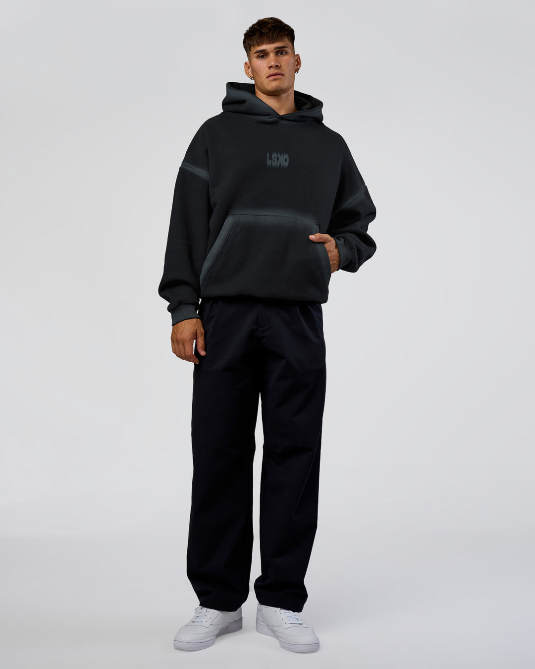 Man wearing Urban Blur Unisex Oversized Hoodie - Black-Dark Storm | Model:Jackson | Size:L - view 10