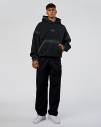 Man wearing Urban Blur Unisex Oversized Hoodie - Black-Dark Storm | Model:Jackson | Size:L | Thumbnail Index: 9