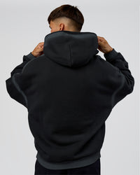 Man wearing Urban Blur Unisex Oversized Hoodie - Black-Dark Storm | Model:Jackson | Size:L | Thumbnail Index: 5