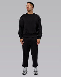 Man wearing Urban Cropped Track Pant - Black| Model:Kaelyb | Size:L | Thumbnail Index: 4
