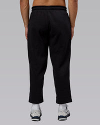 Man wearing Urban Cropped Track Pant - Black| Model:Kaelyb | Size:L | Thumbnail Index: 3