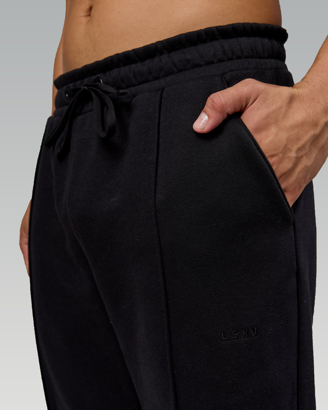 Man wearing Urban Cropped Track Pant - Black| Model:Kaelyb | Size:L - view 3