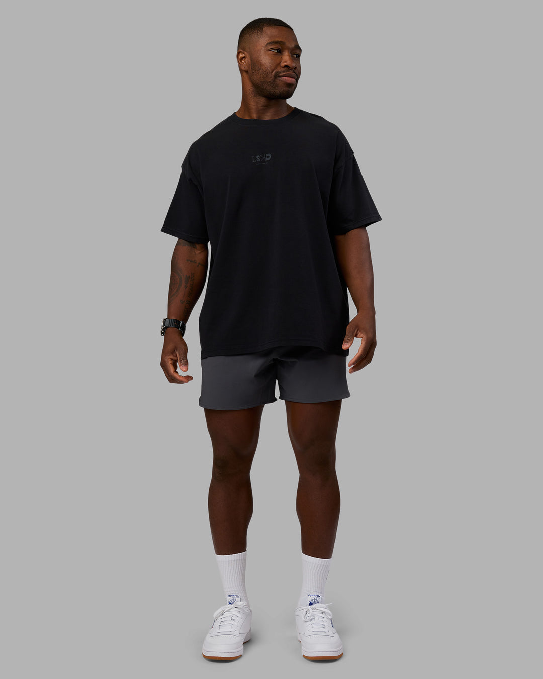 Man wearing Variation Heavyweight FLXCotton Oversized Tee - Black-Black | Model:Sam | Size:L - view 5