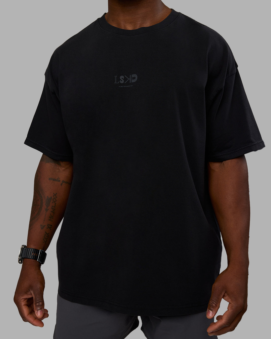 Man wearing Variation Heavyweight FLXCotton Oversized Tee - Black-Black | Model:Sam | Size:L - view 9