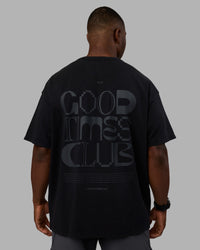 Man wearing Variation Heavyweight FLXCotton Oversized Tee - Black-Black | Model:Sam | Size:L | Thumbnail Index: 1