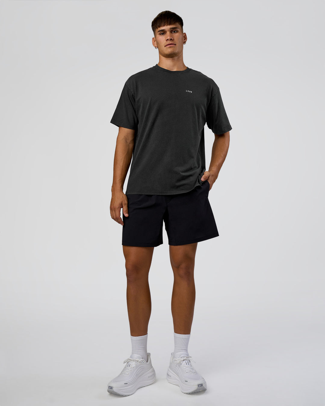 Man wearing We Love This  FLXCotton Oversized Tee - Black Washed-White | Model:Jackson | Size:L - view 6