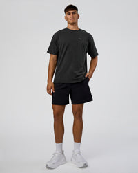 Man wearing We Love This  FLXCotton Oversized Tee - Black Washed-White | Model:Jackson | Size:L | Thumbnail Index: 5