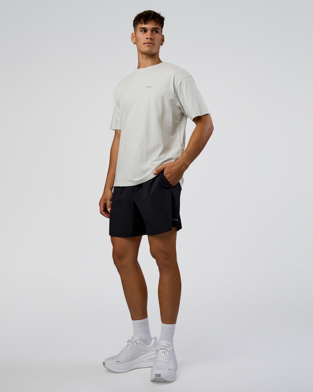 Man wearing We Love This  FLXCotton Oversized Tee - Digital Mist Washed-Electric Indigo | Model:Jackson | Size:L - view 6