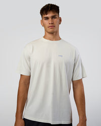 Man wearing We Love This  FLXCotton Oversized Tee - Digital Mist Washed-Electric Indigo | Model:Jackson | Size:L | Thumbnail Index: 2