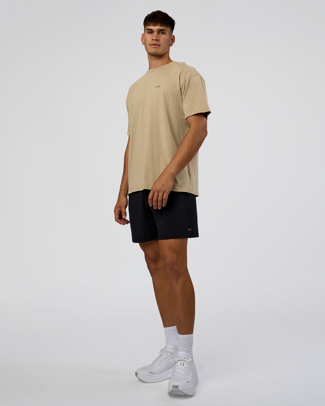 Man wearing We Love This  FLXCotton Oversized Tee - Greige Washed-Black | Model:Jackson | Size:L - view 6