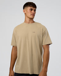 Man wearing We Love This  FLXCotton Oversized Tee - Greige Washed-Black | Model:Jackson | Size:L | Thumbnail Index: 2