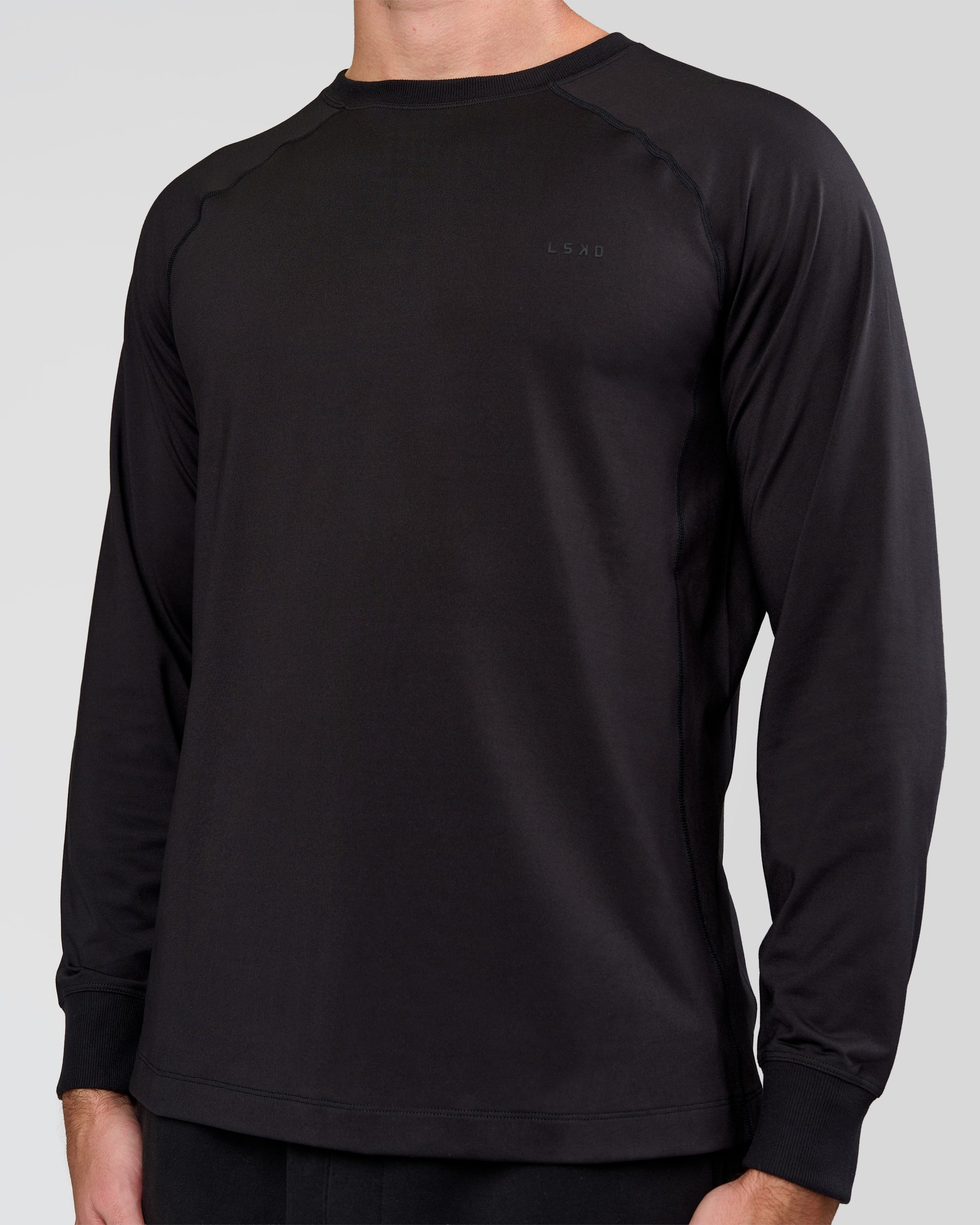 Man wearing Restore CloudFLX Sweater Black | Model:Alex | Size:M