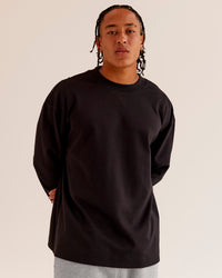 Man wearing AfterDark ZeroCrease Long Sleeve Tee - Black | Model:Malebo | Size:M | Thumbnail Index: 1
