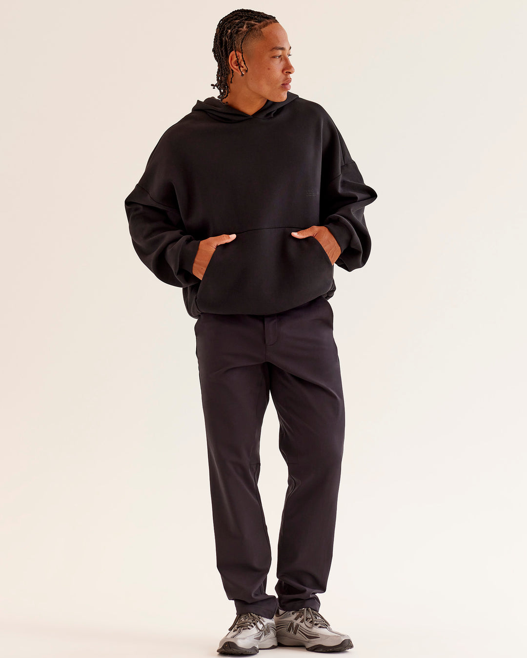 Woman wearing AfterDark ZeroCrease Oversized Hoodie - Black | Model:Loren | Size:XS - view 3
