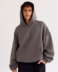 Man wearing AfterDark ZeroCrease Oversized Hoodie - Duskstone | Model:Leandro | Size:M | Thumbnail Index: 1