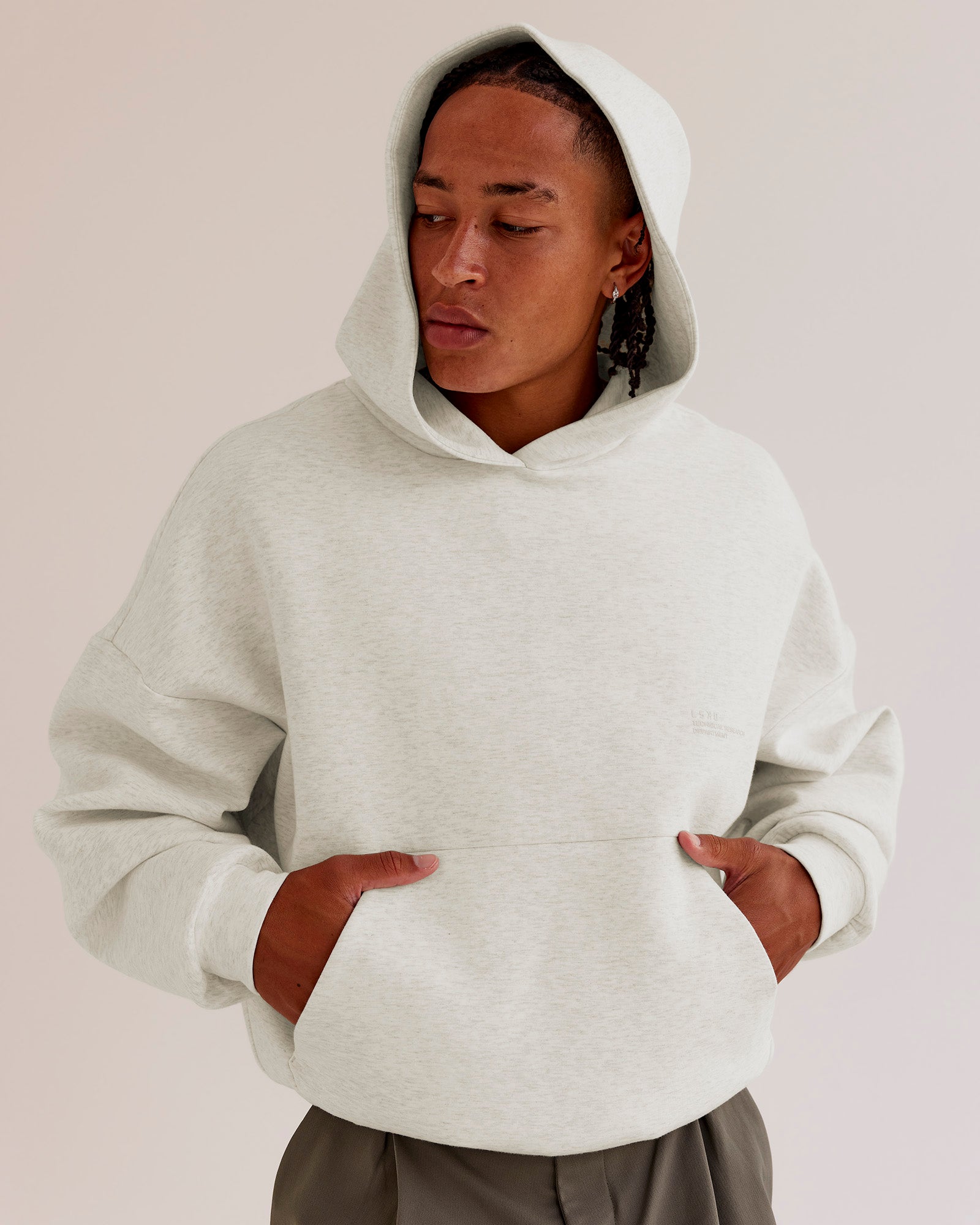 Man wearing AfterDark ZeroCrease Oversized Hoodie - Silver Marl | Model:Malebo |Size:M